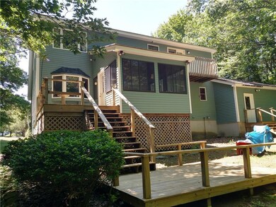 The rear of the home has a sun porch...