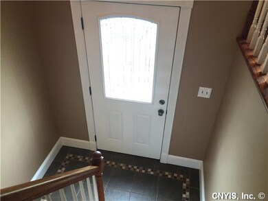Foyer. Stylish front door with leaded glass and  f