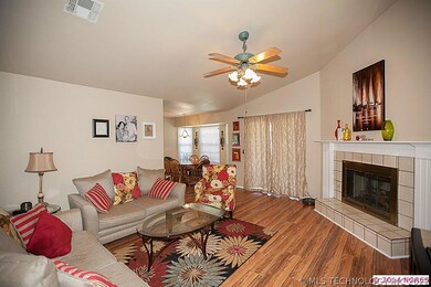 Open living room leads to the dining area.