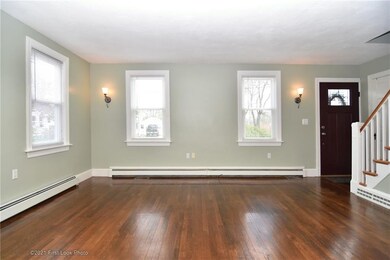 Living Room bright and sunny with beautiful hardwo