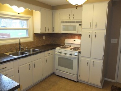 Kitchen comes applianced with refrigerator, gas ra