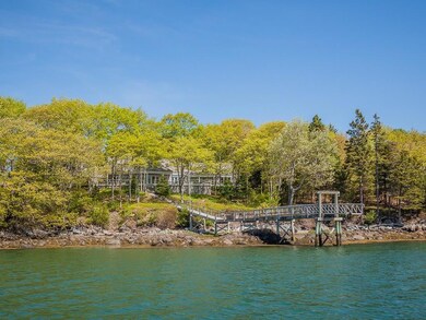 Water side of main house with dock
