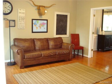 Living Room opens to Foyer and through French Door