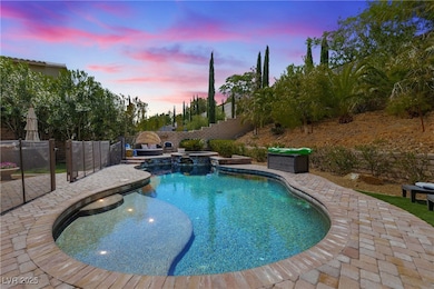 View of pool with fence, a patio area, and a pool