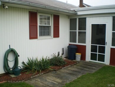 Tidy back yard with just enough to maintain