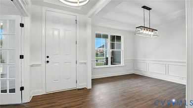 As you enter, you'll be greeted by a formal dining room w/ tray ceiling and a home office with glass French doors located directly off the foyer. 
