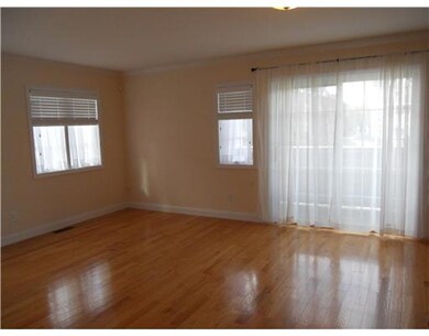 Living Room. HARD WOOD FLOORS AND SLIDING DOOR TO