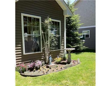 Exterior Back. 2nd flower bed