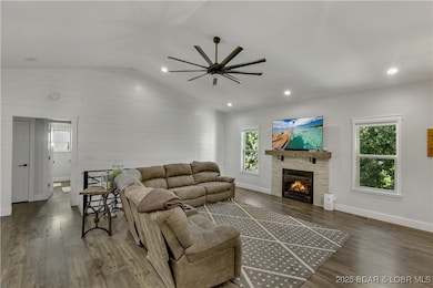Main level living, with captivating details throughout, this home is sure to please. Details such as the stacked stone gas fireplace with custom mantel, luxury plank flooring, recessed lighting, shiplap wall, vaulted ceilings and so much more make for the perfect marriage of tasteful modern design meets farmhouse charm.
