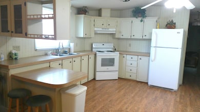 33150 Beach View Dr unit 207, Leesburg, FL 34788 - photo 2