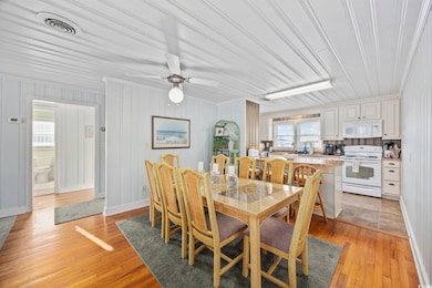Dining space featuring light wood-style flooring, 