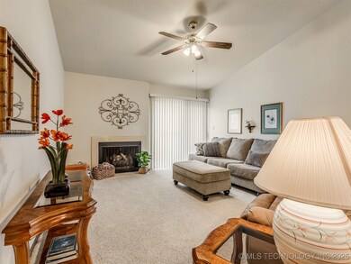 Vaulted ceiling in living with gas fireplace