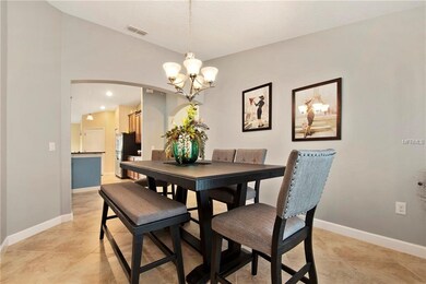 Formal dining room adjacent to kitchen for easy se