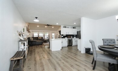 Step into elegance with the sleek luxury vinyl plank flooring that welcomes you upon  entering the house.