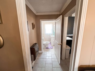 Half bathroom just off the living room area.