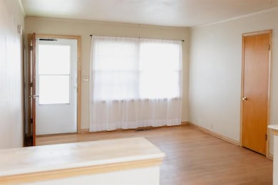 Unfurnished room with crown molding, visible vents