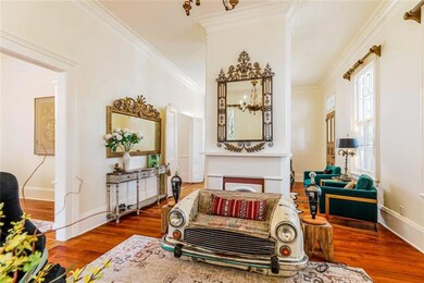 Double parlor with original wood floors, high ceil