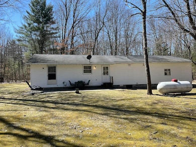 Back of home with patio