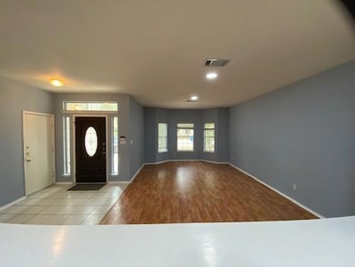 Entryway featuring recessed lighting and tile pat
