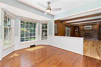 Welcome home to light-filled rooms and hardwood fl