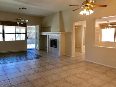 Open floorplan, fireplace and door out to the extr