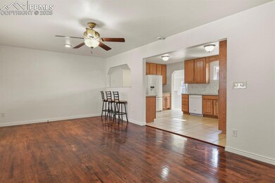 Large entrance to kitchen with pass through window