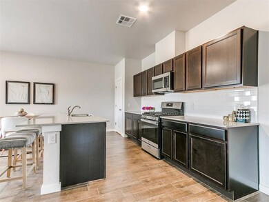 *Photo is of a completed home of the the same floo