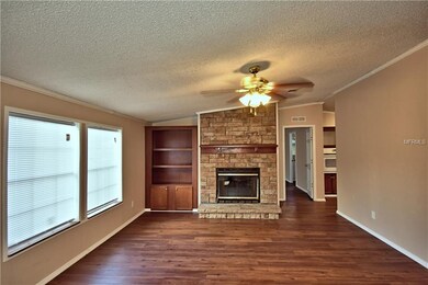Gorgeous great room with fireplace and built-in ca