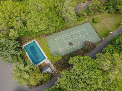 Wilton Crest residents enjoy a pool, tennis courts