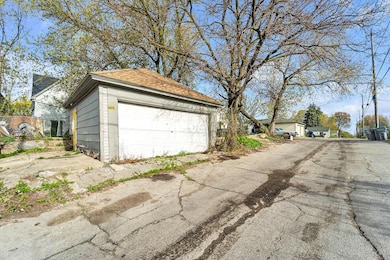 2 Car Garage w/ Additional 1 Car Slab