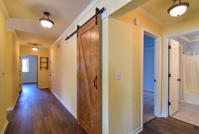 Hallway with barn door