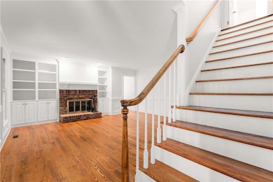 Stairs from family room to upper level
