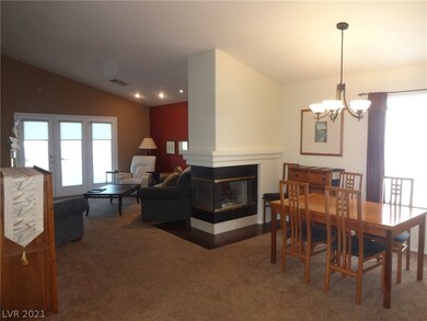 Family/Dining room combo with three way gas firepl
