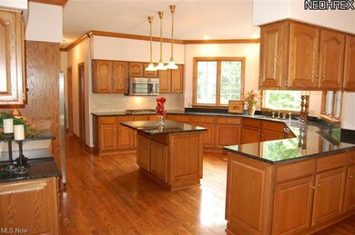 Gorgeous kitchen with granite, center island break