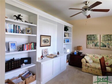 Built in book shelves in front room office.