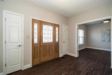 Closets flank the front door.