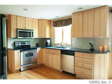 Kitchen. Updated kitchen with maple cabinets, hard