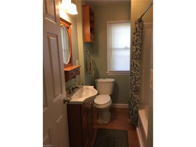 Updated full bathroom with linen closet.