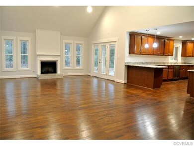 Massive light filled great room with charming marb