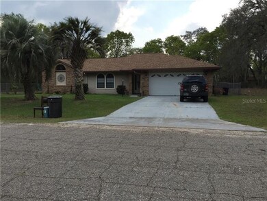 Nearby neighbors home across from the lot