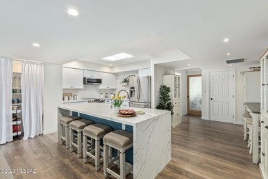 kitchen opens to living room
