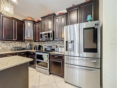 1303 Sea Pines Way, Davenport, FL 33896 - photo 7