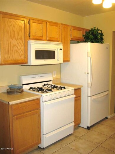 kitchen gas range, micro and fridge