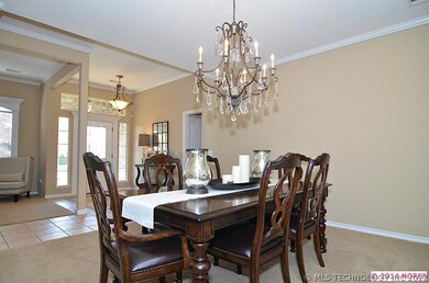 Formal dining is across the walkway from the entry