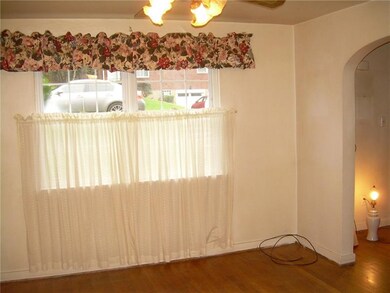 Big window in dining room lets in lots of light.