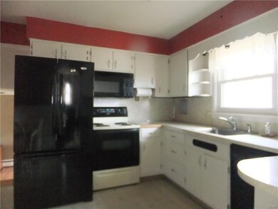 Kitchen with white cabinets