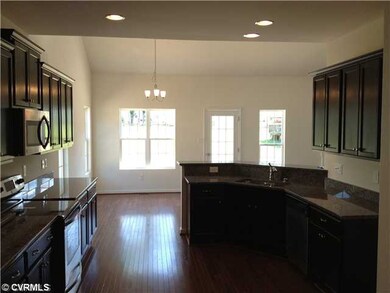 Kitchen - Open kitchen- with gorgeous hardwood floors and granite counters with bar-top!!