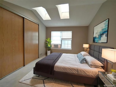 Master Bedroom with skylight (virtually staged)