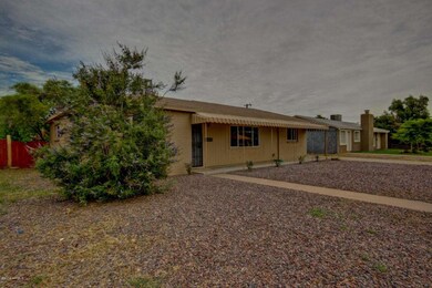 HUGE FRONT YARD WITH COVERED PATIO