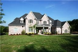 Located on Spencer Creek from the front porch you view beautifuls woodlands across the street.